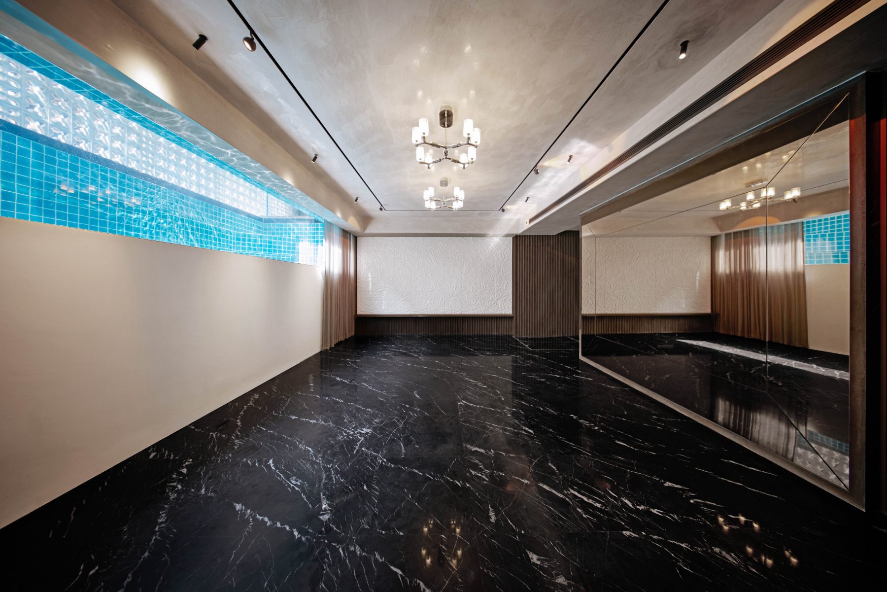 52 Carrisbrooke Grove — Basement level entertainment room with view of the pool